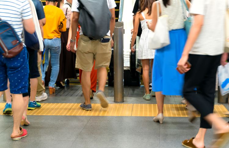 people going towards escalator