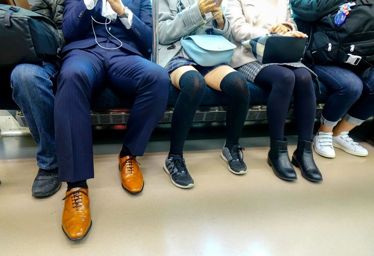 passengers' shoes aboard a train