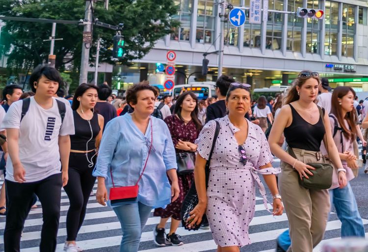 foreign tourists at shibuya scramble