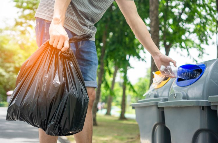 recycling trash in a park