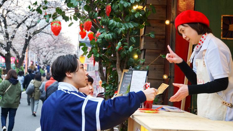 customer at outdoor stall Japan