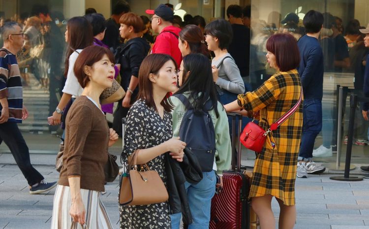 Japanese women walking down the street