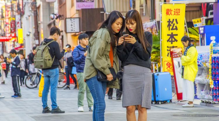 two Japanese women on their phone