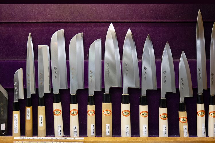 Japanese knives lined up on display