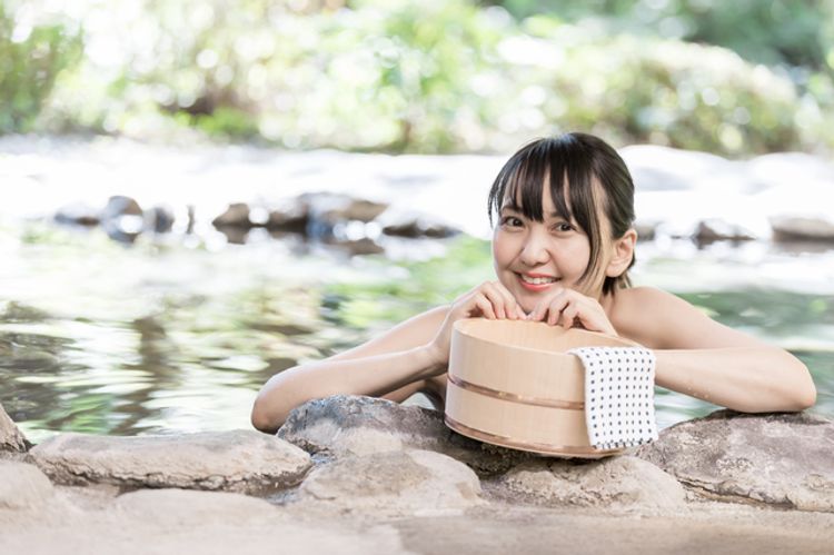 woman enjoying sento