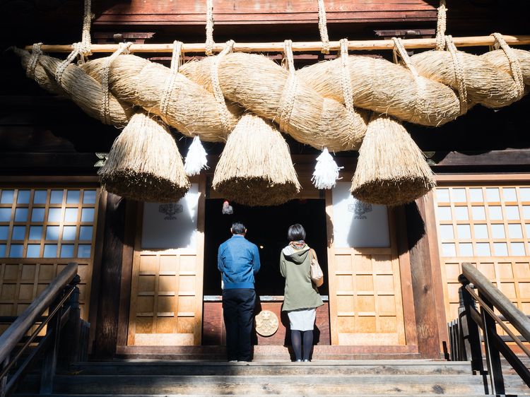 praying at a temple